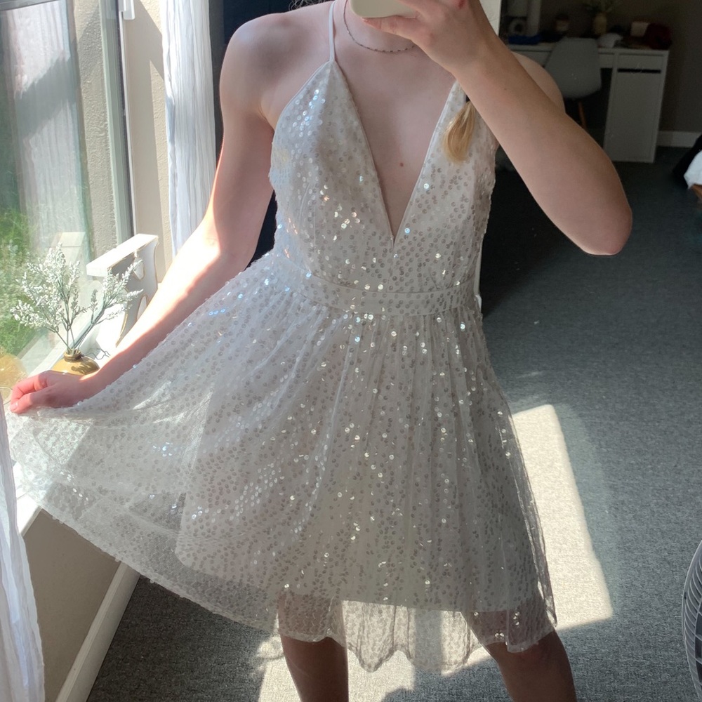 Maniju Low V-Neck Mini Dress